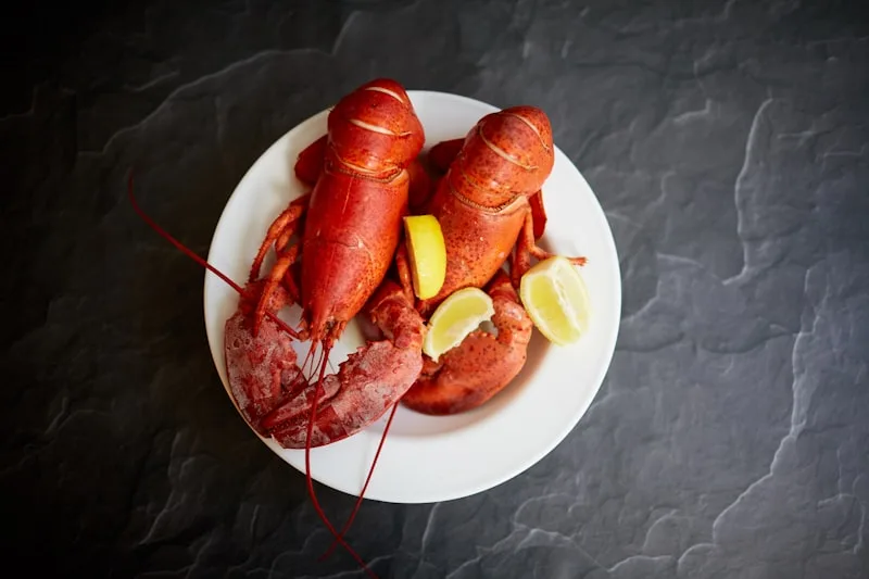 Twin steamed lobsters with lemon